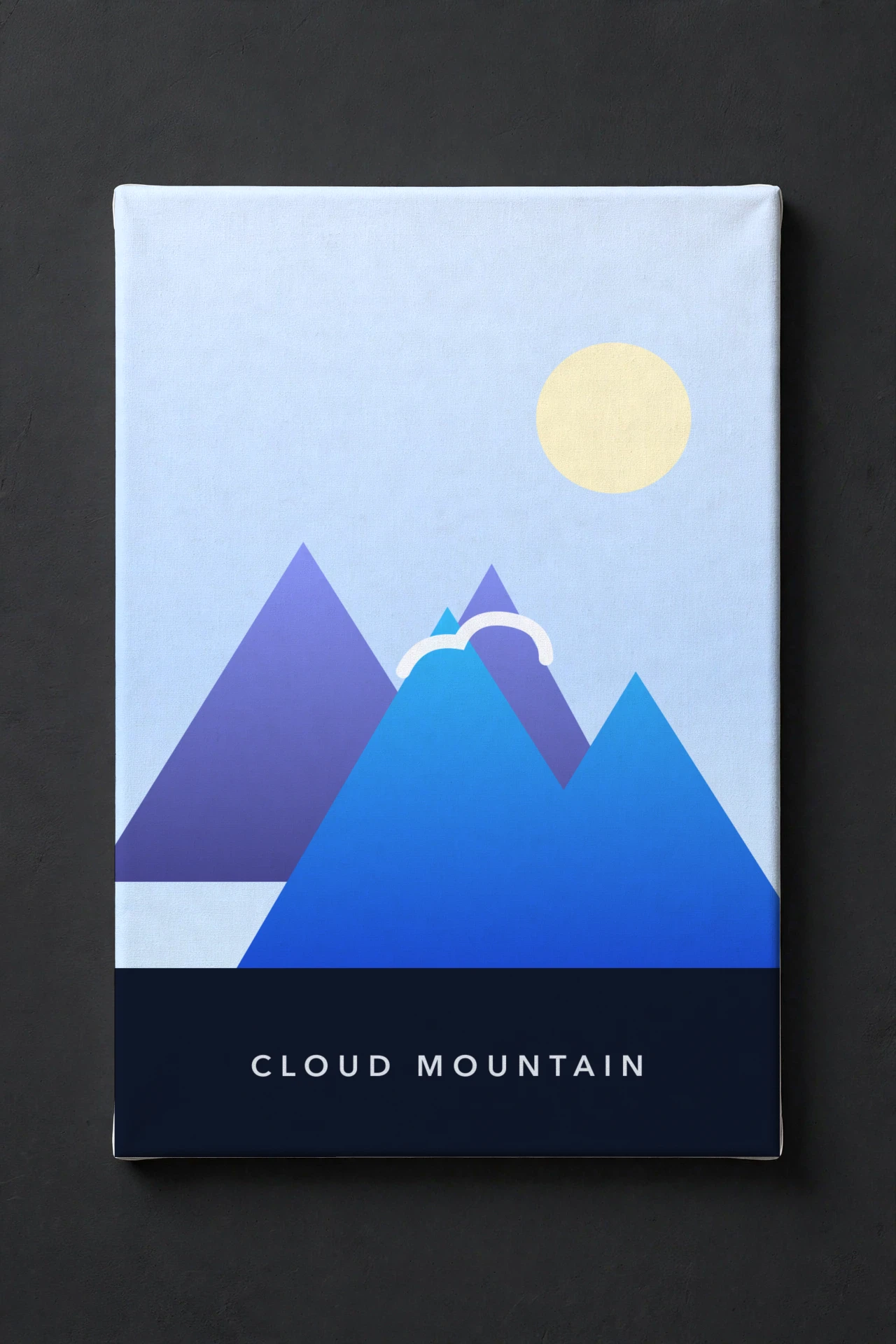 Canvas gallery wrap with an azure mountain artwork on a dark gallery wall