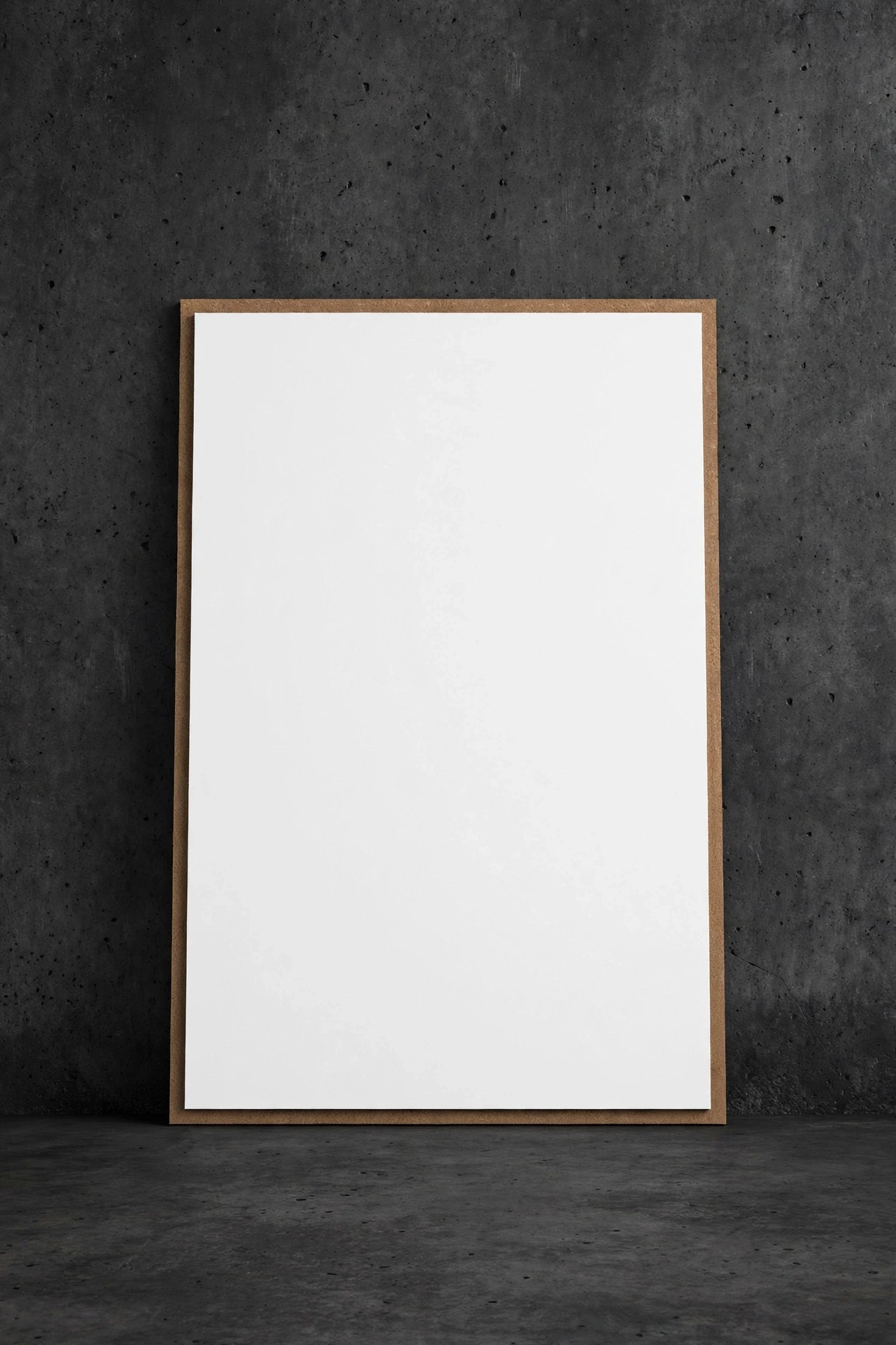 Blank white rigid eco display board leaning against a dark wall