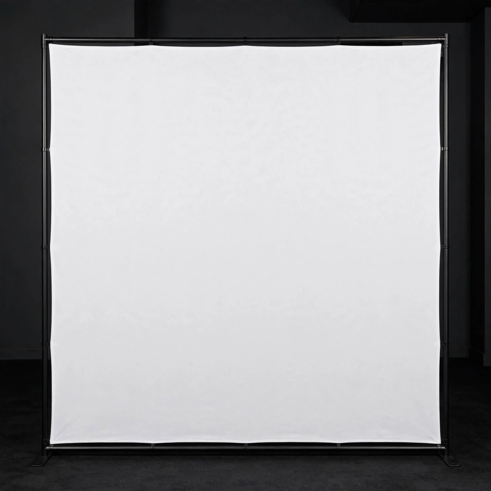 Blank white step and repeat backdrop wall standing on its tube frame