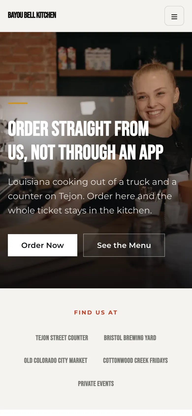 An example restaurant website on a phone, its own domain name in the address bar.