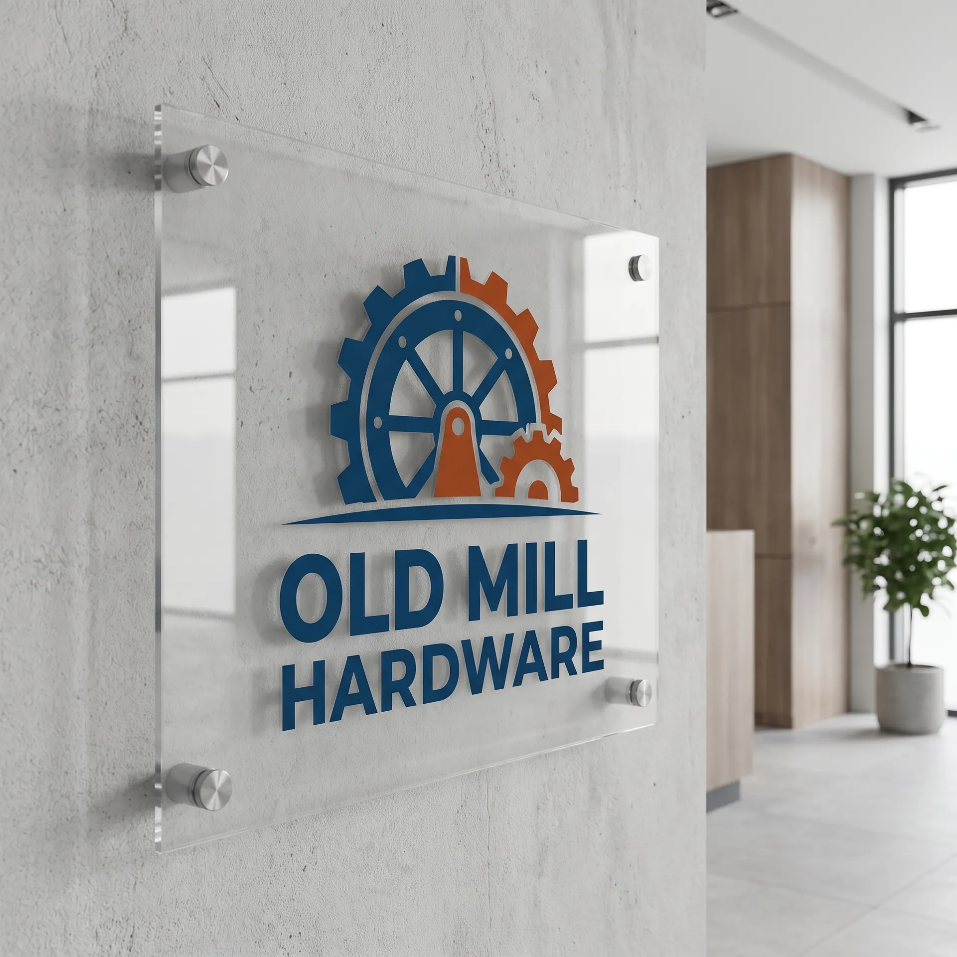 18 x 24 inch clear 1/4 inch acrylic sign with polished edges, printed on the back face, held off the wall on four brushed steel standoffs, shown with a sample design: on the reception wall of a modern office lobby