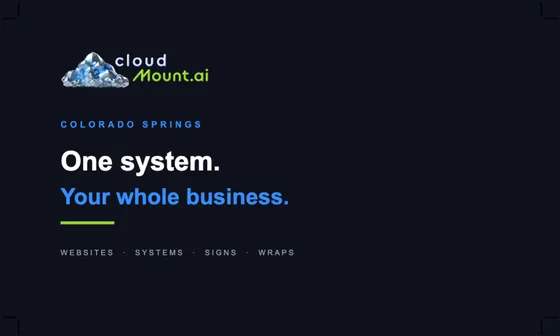 The front of our own business card: the CloudMount.ai logo and “One system. Your whole business.” on navy